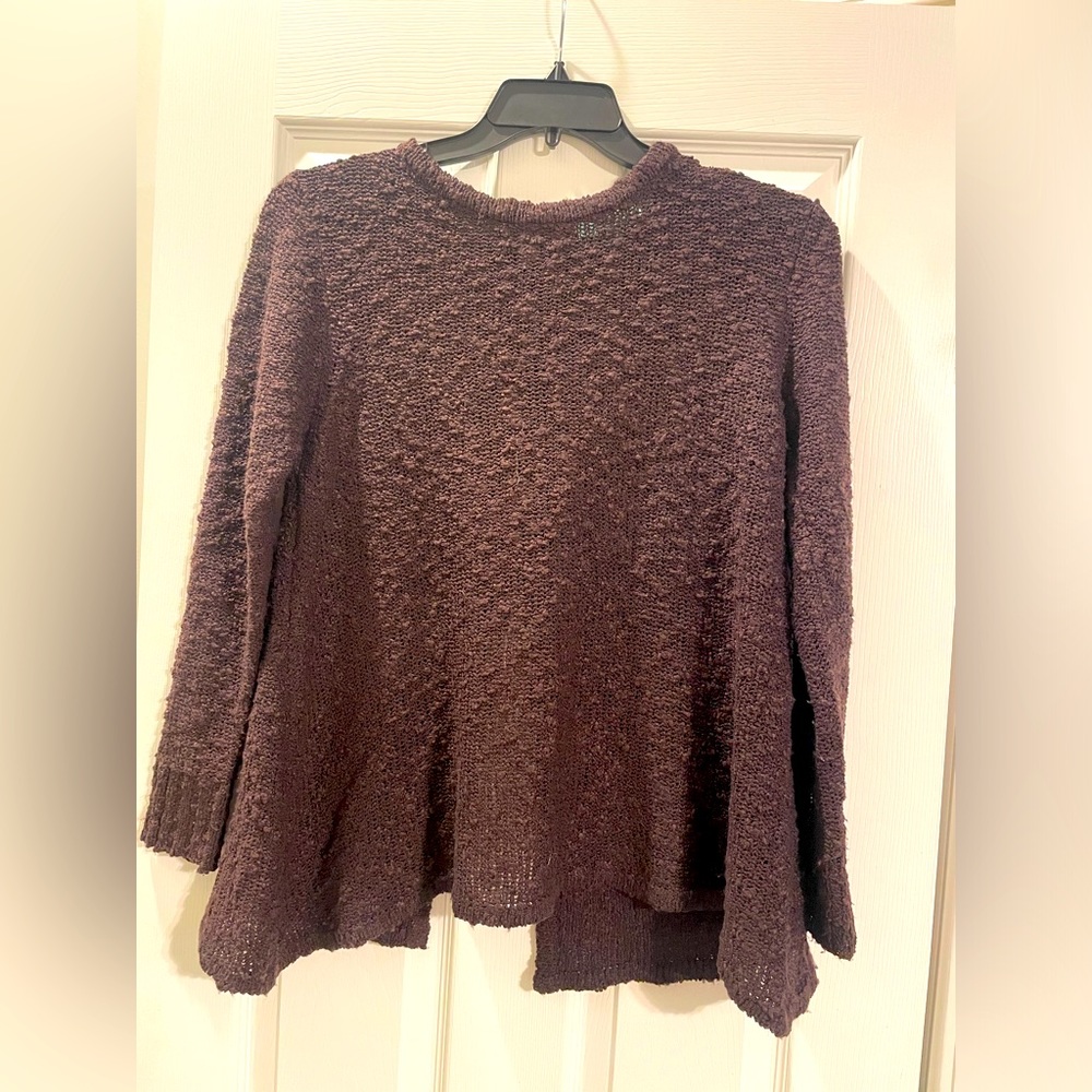 Women’s sweater with open back